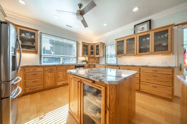 a view of backyard with swimming pool