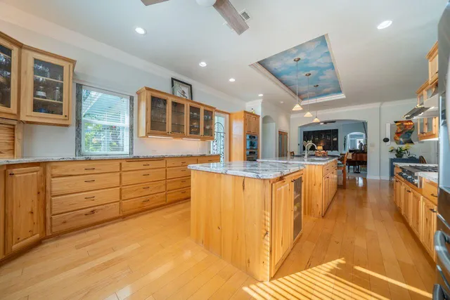 a view of a chairs and table in backyard