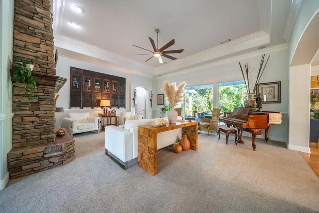an aerial view of a house with garden space and street view