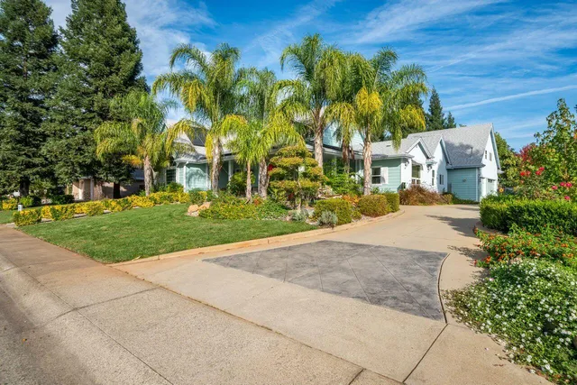 a outdoor living space with furniture and a potted plant