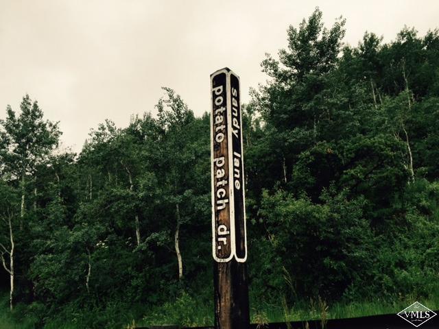 a street sign next to a road