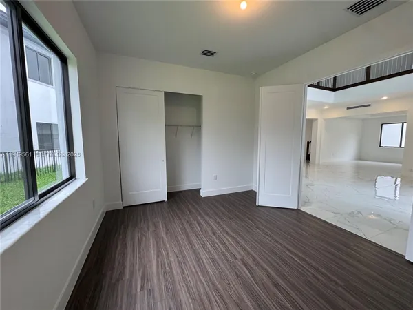 a bathroom with a sink double vanity and a mirror