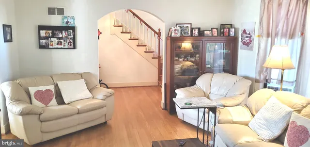 a view of a livingroom with wooden floor