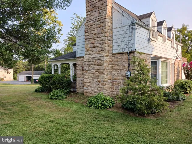 a view of a house with a garden