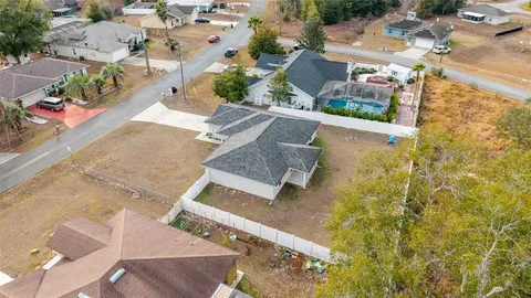 view of a house with a backyard