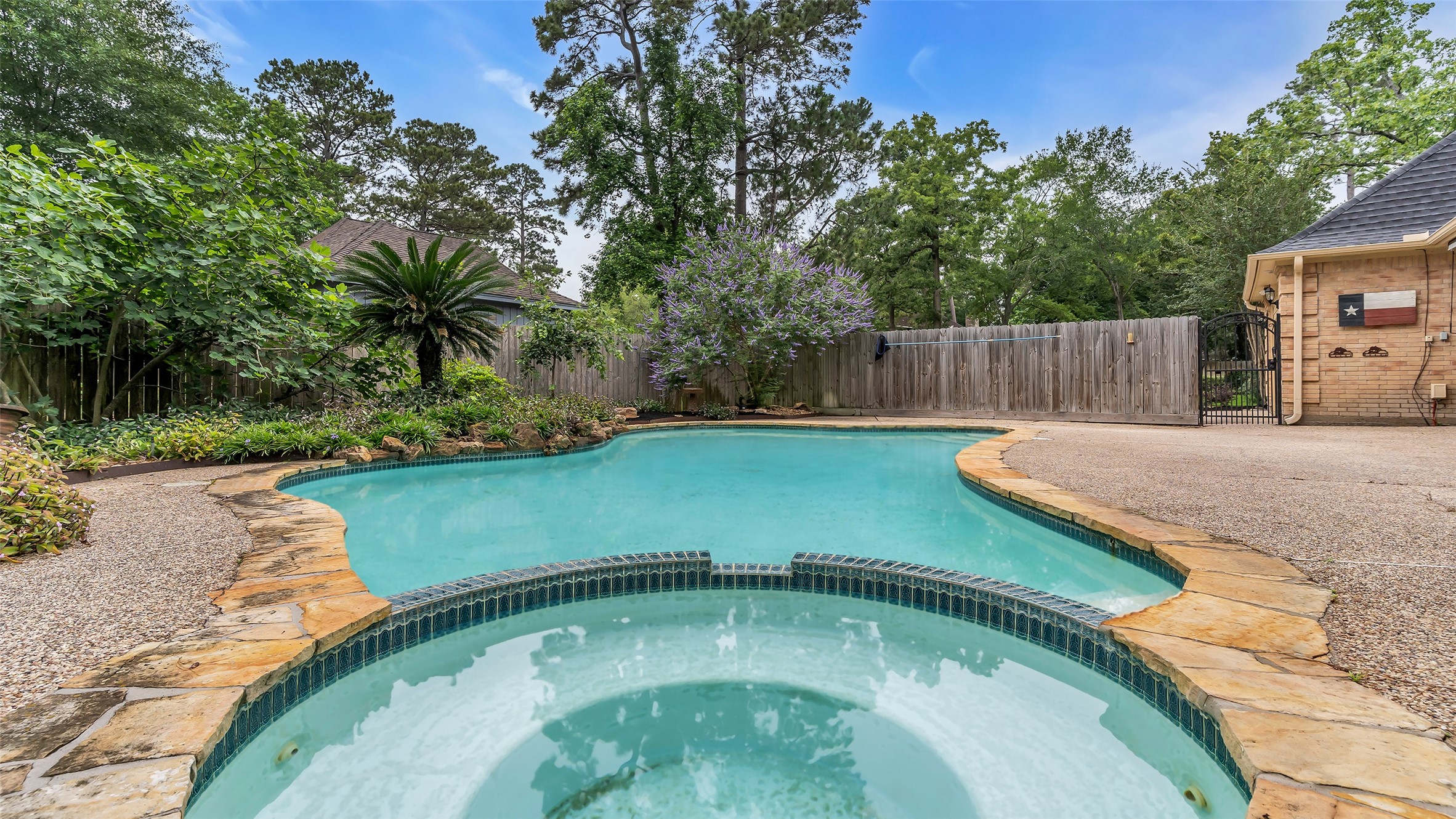 2607 Laurel Ridge Drive Houston, TX 77345 - Photo 45 of 47 a view of a backyard with a small cabin