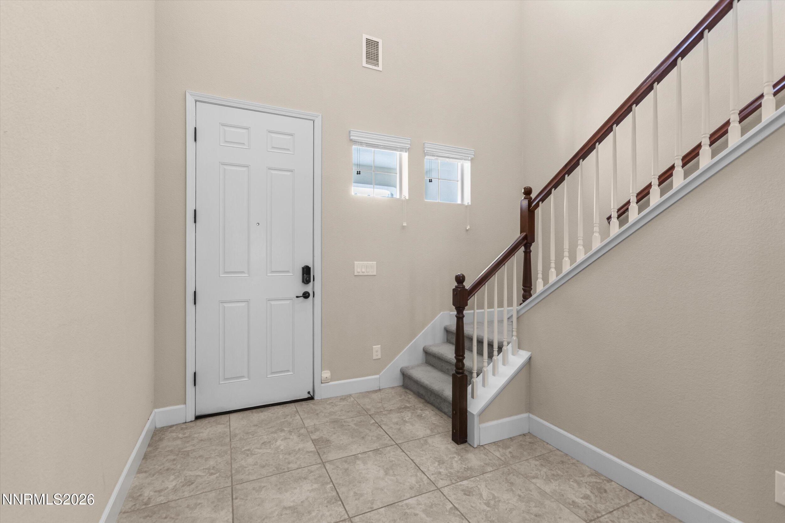 1725 Verdi Vista Court Reno, NV 89523 - Photo 5 of 37 a view of entryway with wooden floor and stairs