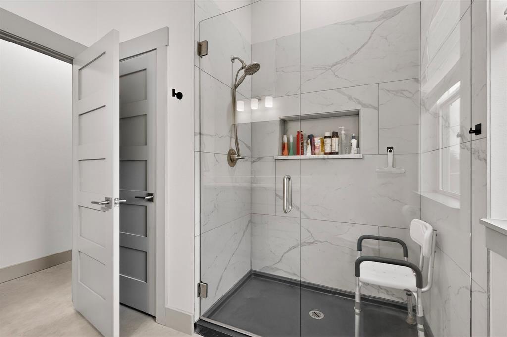 613 Kentucky Town Road Whitewright, TX 75491 - Photo 25 of 39 a bathroom with a sink and shower