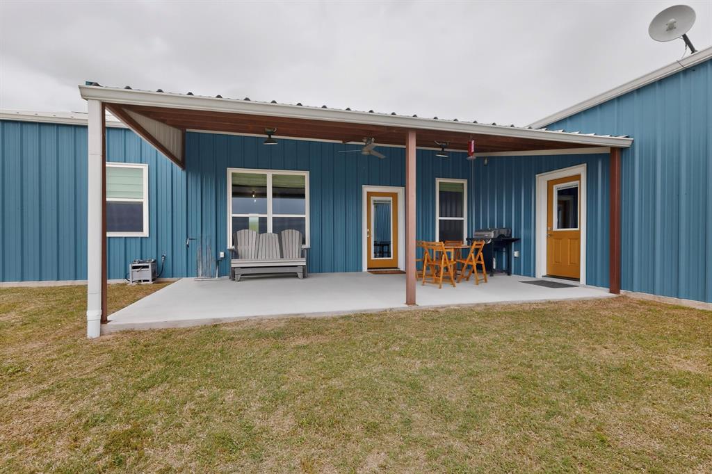 613 Kentucky Town Road Whitewright, TX 75491 - Photo 29 of 39 a view of a house with porch and furniture