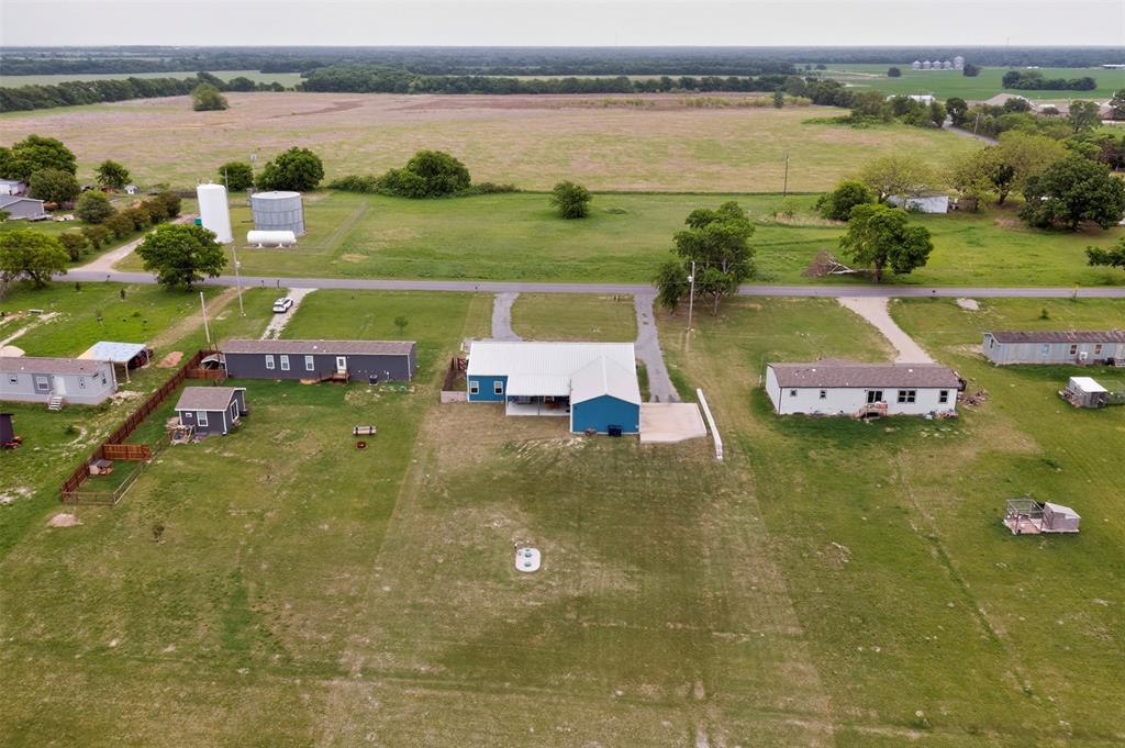 613 Kentucky Town Road Whitewright, TX 75491 - Photo 37 of 39 a view of a lake with houses