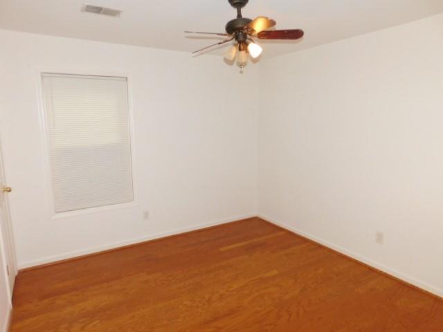 1710 Pine Road Marietta, GA 30062 - Photo 16 of 23 an empty room with a fan