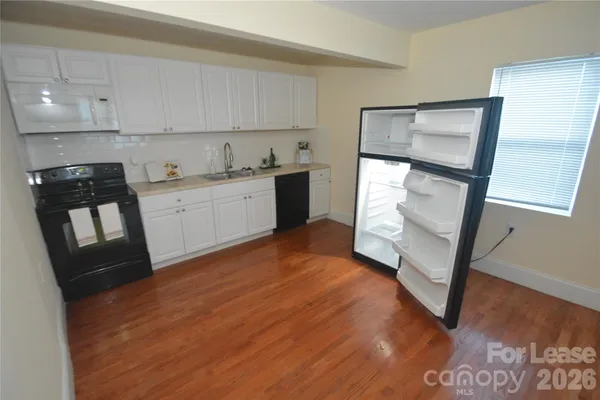 $1,250 | 1537 Hawthorne Lane, Charlotte, NC 28205