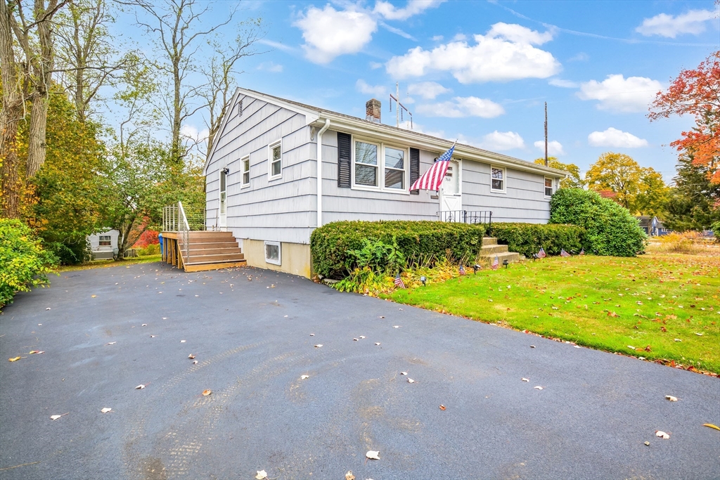 360 High Street Whitman, MA 02382 - Photo 29 of 33 a front view of house with yard and green space