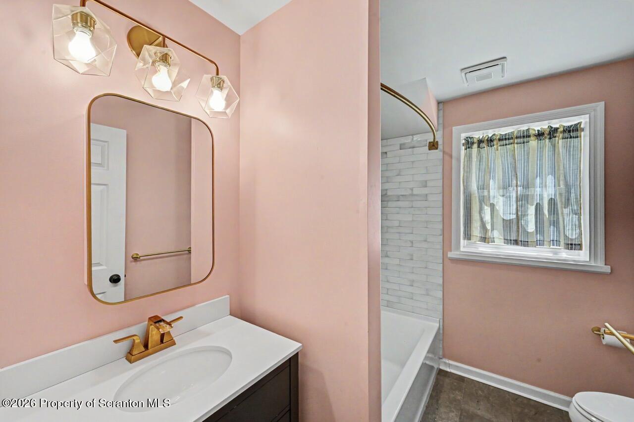 457 Craig Road Dalton, PA 18414 - Photo 64 of 114 a bathroom with a sink a mirror and a shower