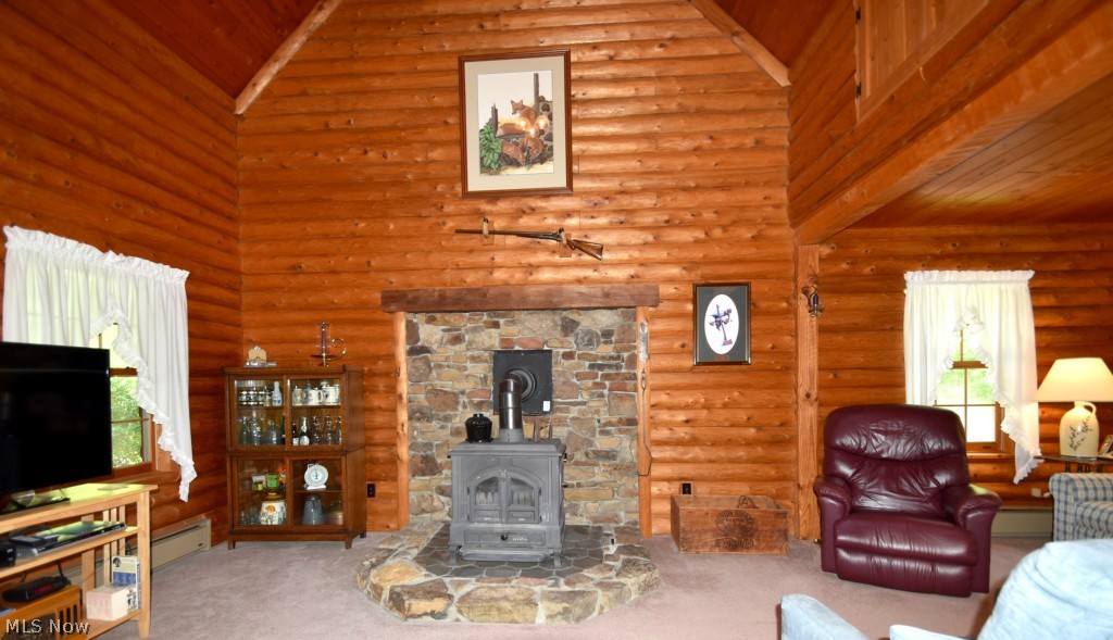 15937 Thompson Road Thompson, OH 44086 - Photo 3 of 25 The great room area is the center of this home. Rustic to traditional options for decor. Peaceful existance.
