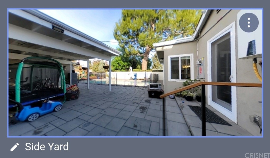 14721 Weddington Street Sherman Oaks, CA 91411 - Photo 16 of 17 a lobby with furniture and a floor to ceiling window