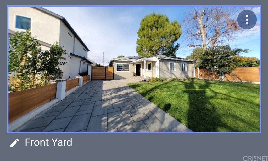 14721 Weddington Street Sherman Oaks, CA 91411 - Photo 3 of 17 a view of a house with a yard