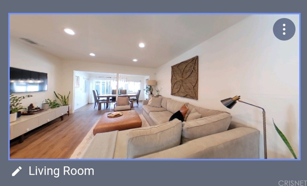 14721 Weddington Street Sherman Oaks, CA 91411 - Photo 5 of 17 a living room with furniture and a large window