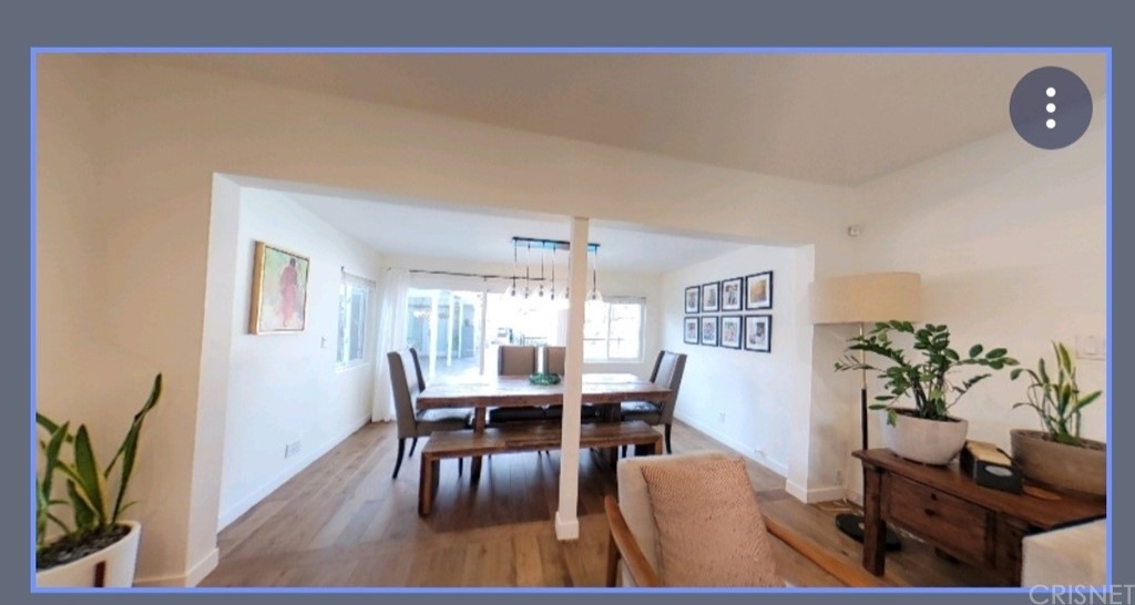 14721 Weddington Street Sherman Oaks, CA 91411 - Photo 6 of 17 a view of a dining room with furniture window and wooden floor