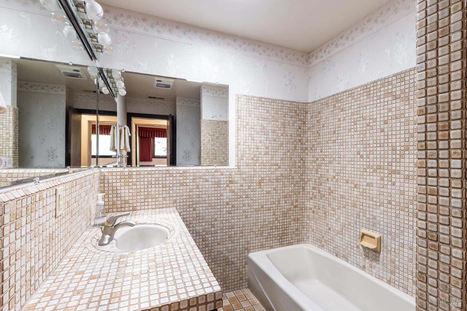 2236 West Hearn Avenue Santa Rosa, CA 95407 - Photo 32 of 56 a bathroom with a sink a toilet and shower