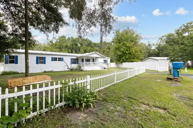 a house view with a garden space