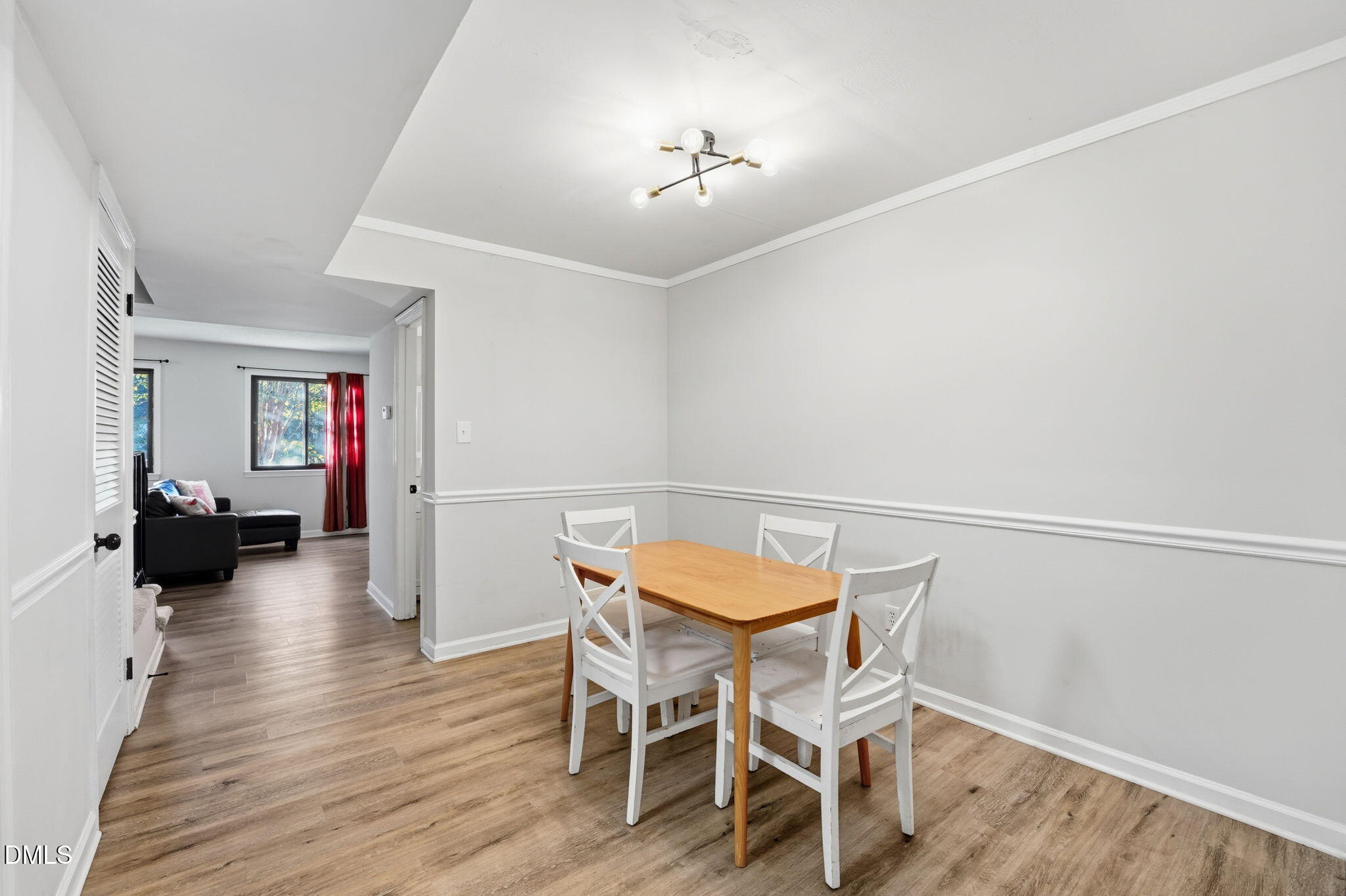 617 Springview Trail Garner, NC 27529 - Photo 12 of 25 a view of a room with furniture and wooden floor
