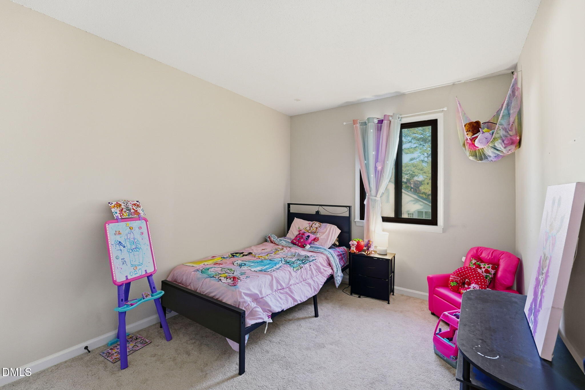 617 Springview Trail Garner, NC 27529 - Photo 15 of 25 a bedroom with furniture and a bed