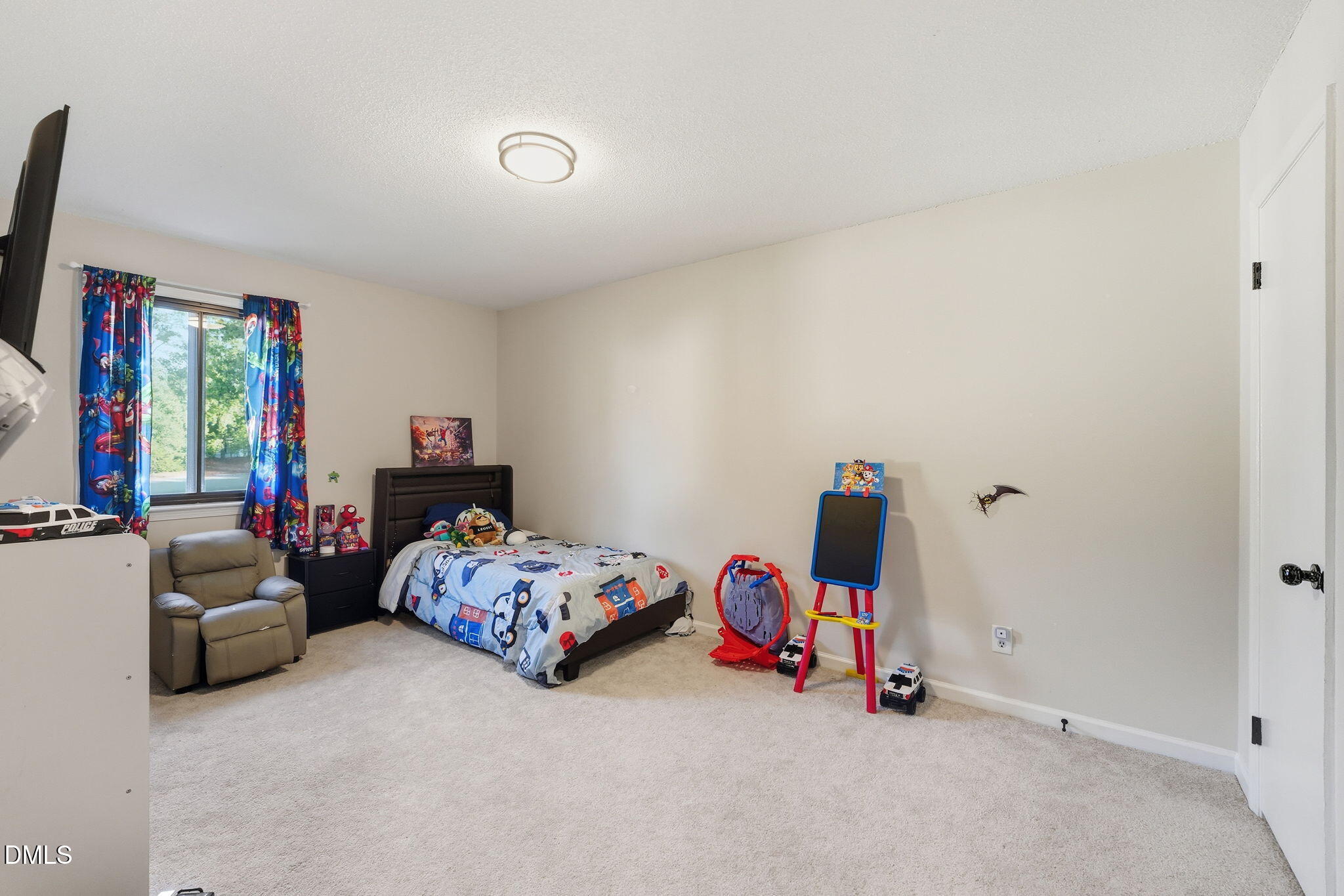 617 Springview Trail Garner, NC 27529 - Photo 16 of 25 a bedroom with furniture and a bed