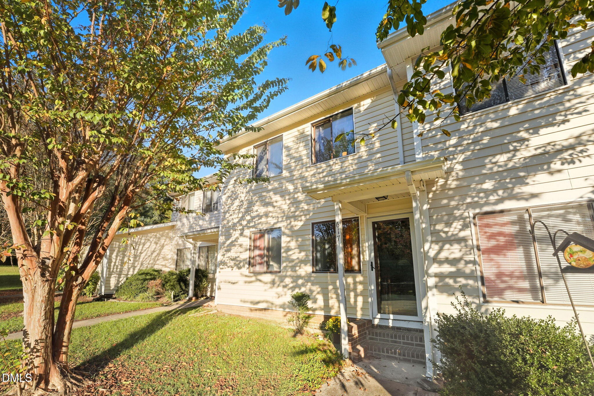 617 Springview Trail Garner, NC 27529 - Photo 2 of 25 a view of a building with a tree