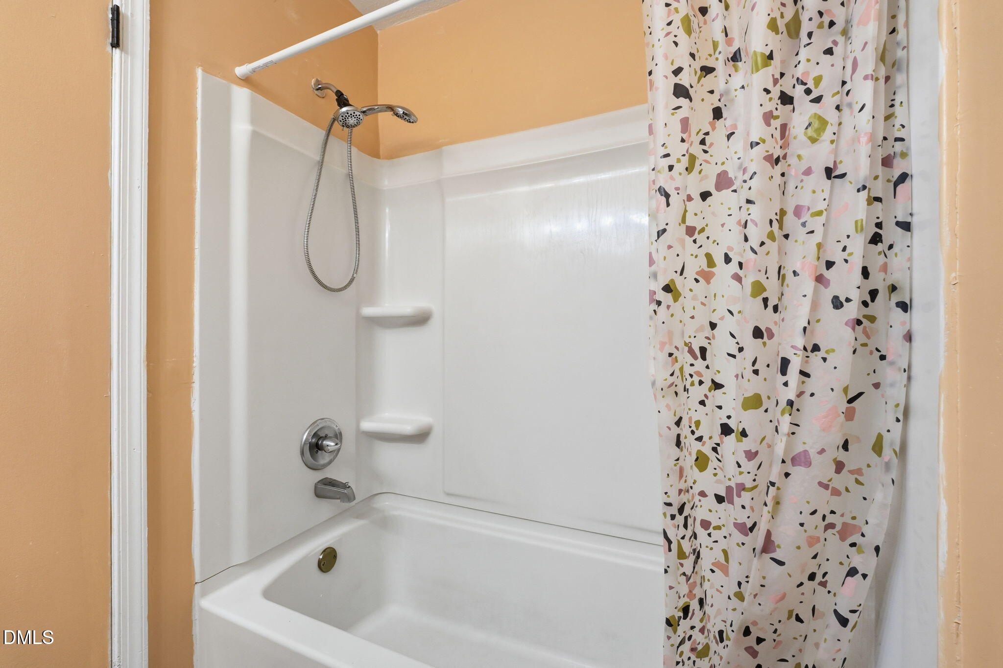 617 Springview Trail Garner, NC 27529 - Photo 23 of 25 a bathroom with a bath tub and shower
