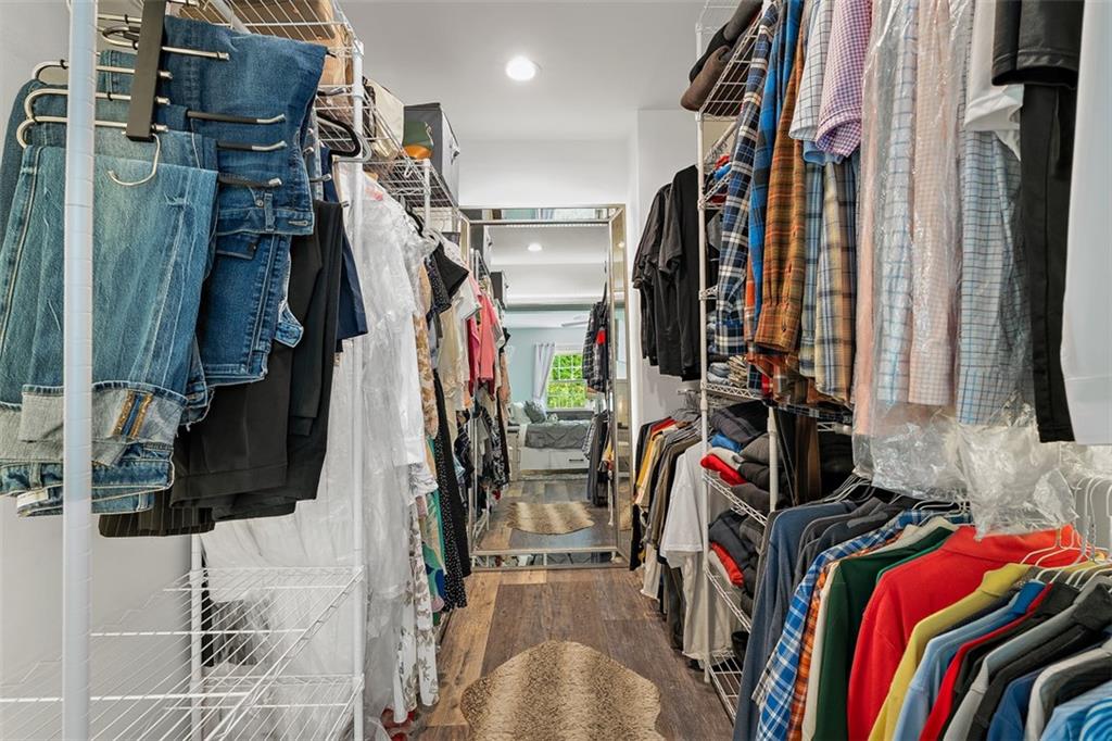 505 Center Grange Road Monaca, PA 15061 - Photo 19 of 43 a view of walk in closet with clothes and shoes