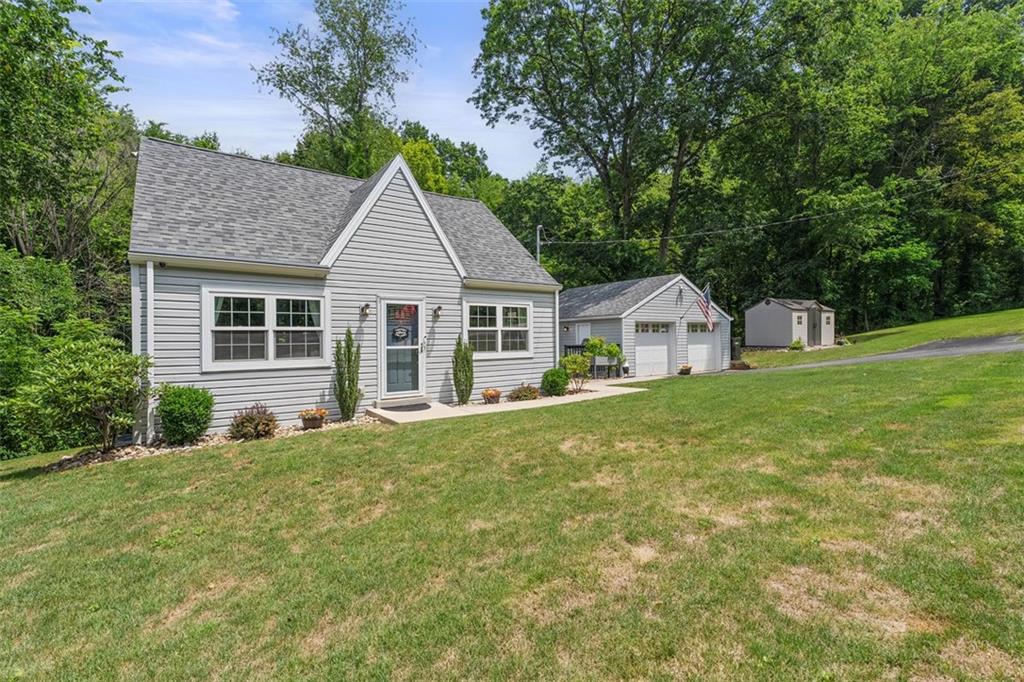 505 Center Grange Road Monaca, PA 15061 - Photo 2 of 43 a house view with a garden space