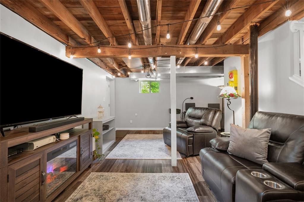 505 Center Grange Road Monaca, PA 15061 - Photo 29 of 43 a room with furniture and a flat screen tv