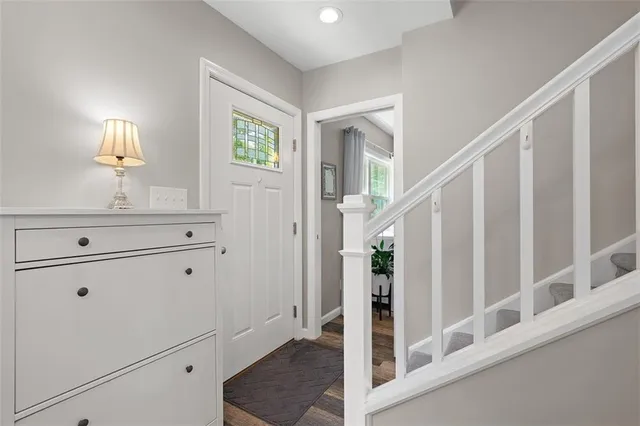 a view of a hallway with front door