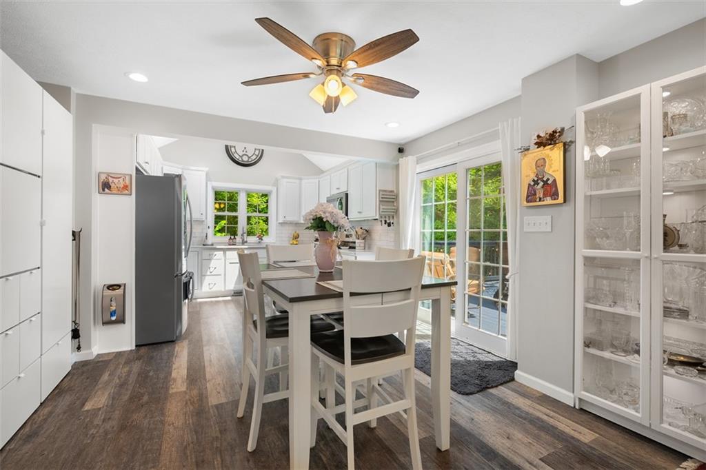 505 Center Grange Road Monaca, PA 15061 - Photo 10 of 43 a view of a dining room with furniture window and wooden floor