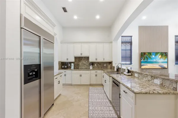 $10,000 | 9564 Aspen Exbury Court, Parkland, FL 33076