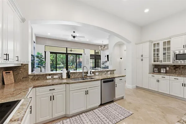 $10,000 | 9564 Aspen Exbury Court, Parkland, FL 33076