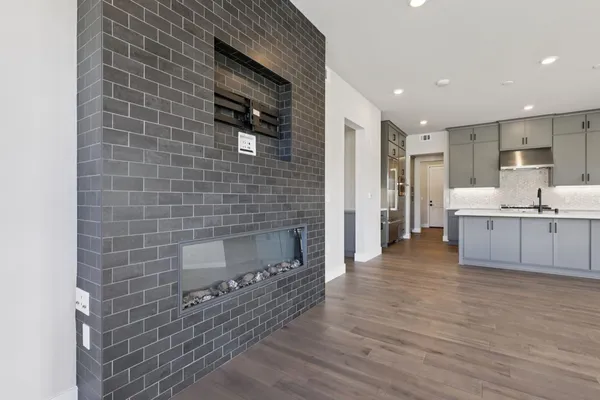 a bathroom with a sink a mirror and shower