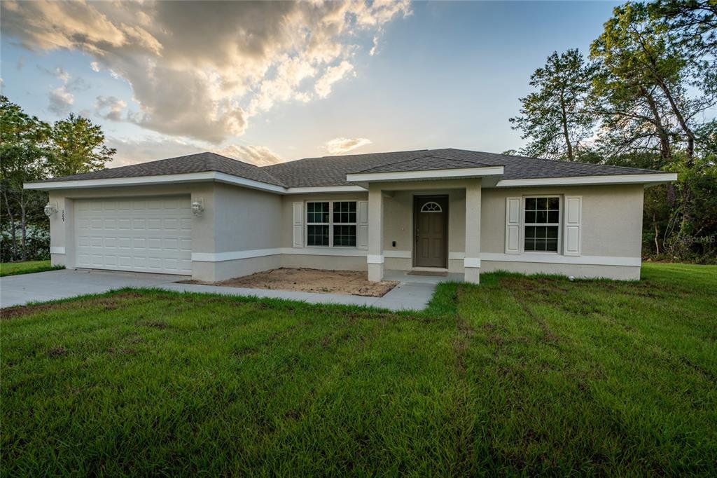 20 Hemlock Circle Ocala, FL 34472 - Photo 1 of 1 a house view with a garden space