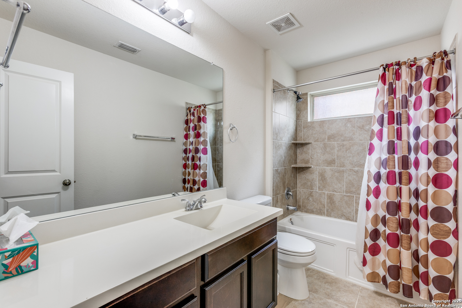 445 Red Morganite Trail Buda, TX 78610 - Photo 17 of 25 a bathroom with a sink toilet and shower