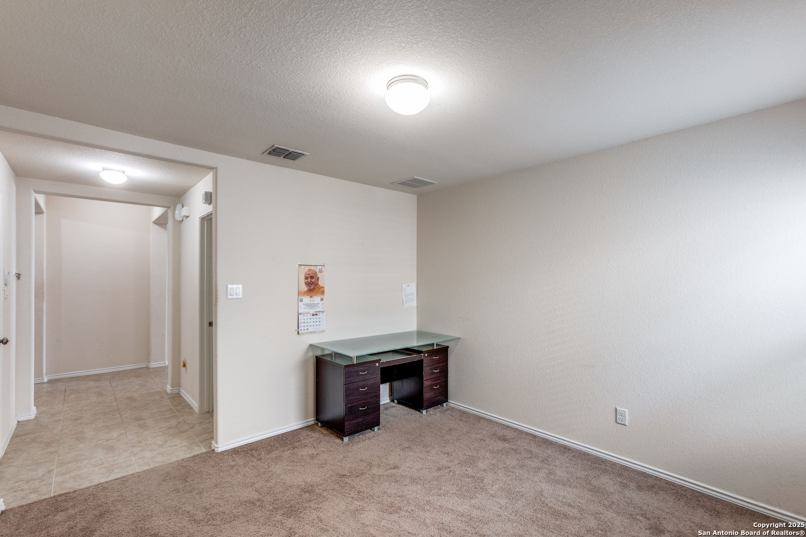 445 Red Morganite Trail Buda, TX 78610 - Photo 19 of 25 a view of an empty room