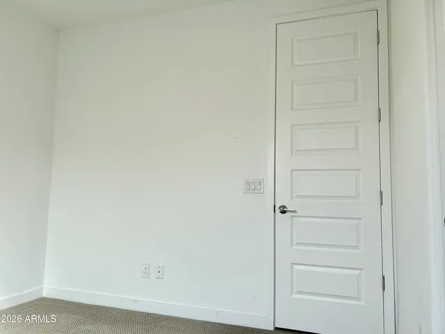 a bathroom with a shower and a toilet