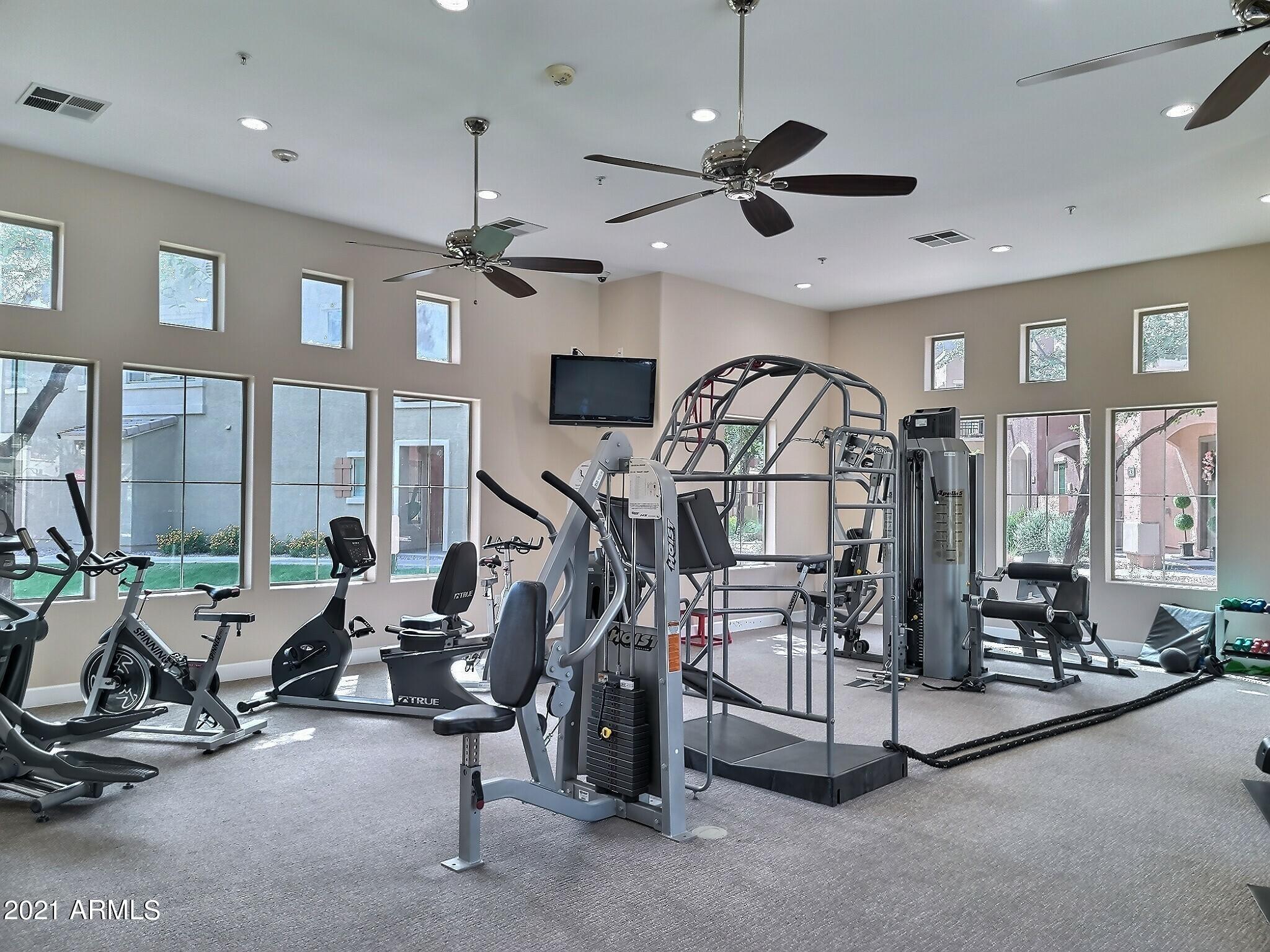 240 West Juniper Avenue, Unit 1111 Gilbert, AZ 85233 - Photo 17 of 22 a view of a room with gym equipment