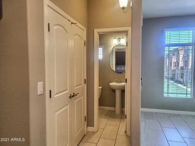 a view of a bathroom from a hallway