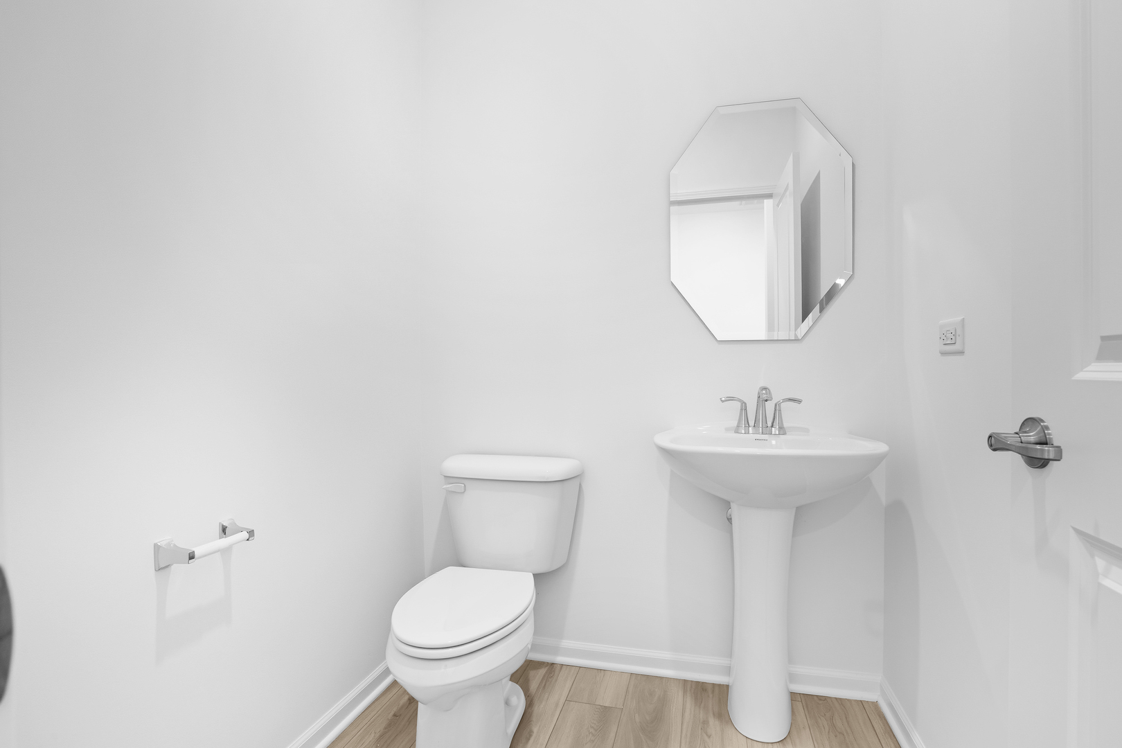 269 Red Oak Circle Volo, IL 60020 - Photo 15 of 17 a bathroom with a toilet sink and mirror