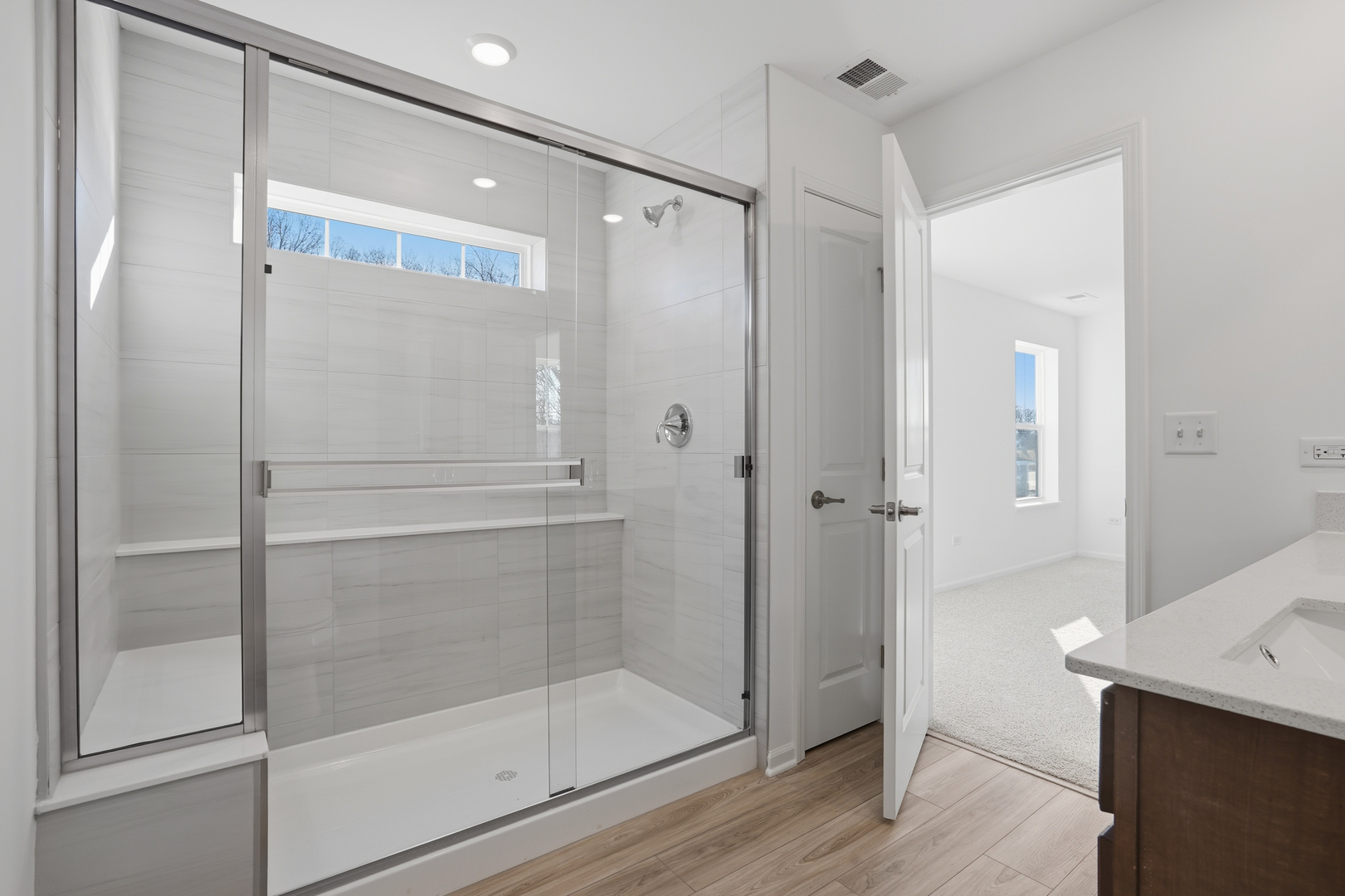269 Red Oak Circle Volo, IL 60020 - Photo 10 of 17 a bathroom with a glass shower door