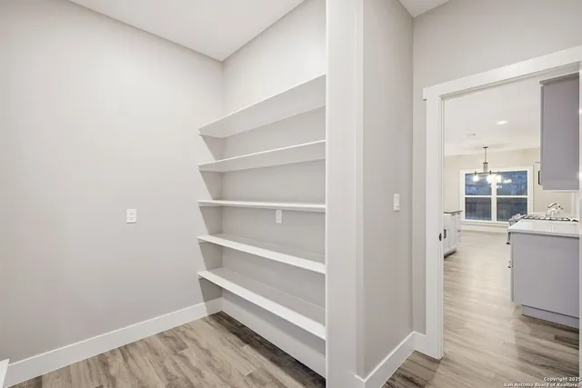 a room with storage and utility room