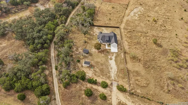 a view of a town with mountains in the background