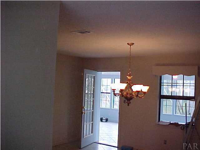 1399 Wishbone Road Cantonment, FL 32533 - Photo 16 of 18 LIVING ROOM TO DINING AREA