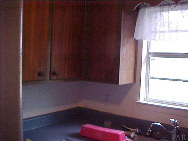 1399 Wishbone Road Cantonment, FL 32533 - Photo 17 of 18 WOOD CABINETS IN KITCHEN